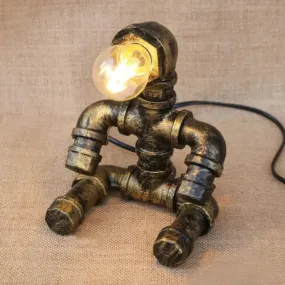 Vintage Stylish Sitting Robot Wrought Iron Table Lamp with Antique Brass Plumbing Pipe