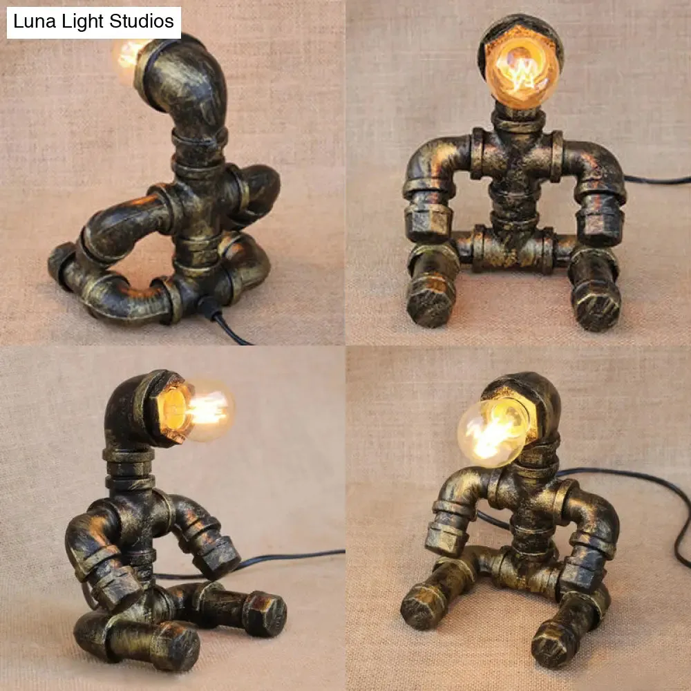 Vintage Stylish Sitting Robot Wrought Iron Table Lamp with Antique Brass Plumbing Pipe