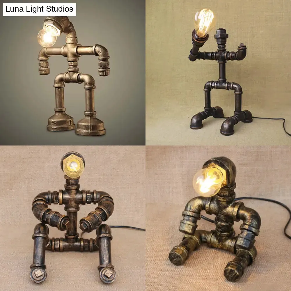 Vintage Stylish Sitting Robot Wrought Iron Table Lamp with Antique Brass Plumbing Pipe